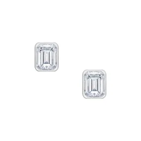 18 Karat .55ct Emerald Cut Bezel Set Stud Earrings