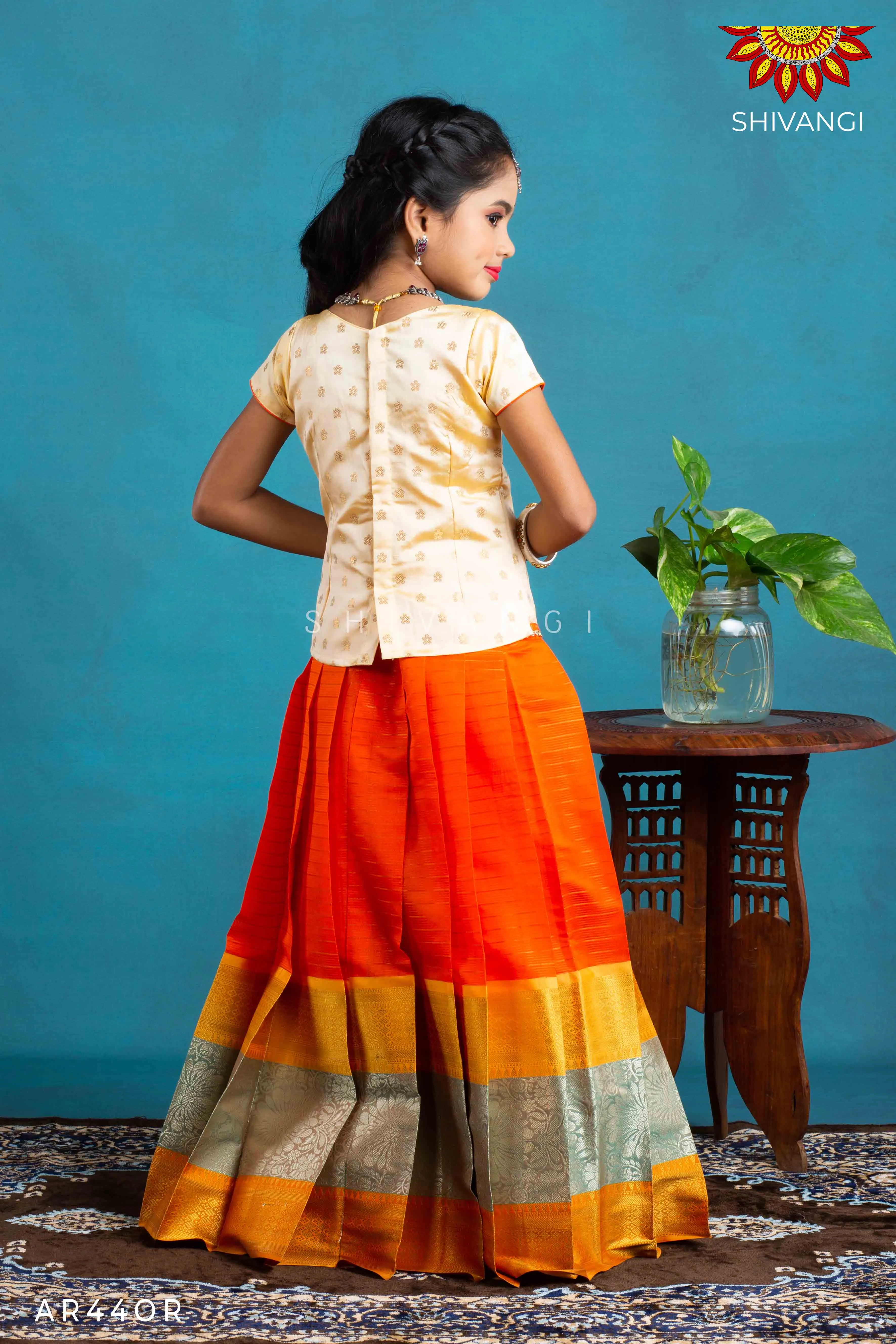 Girls Orange Floral Spring Pattu Pavadai